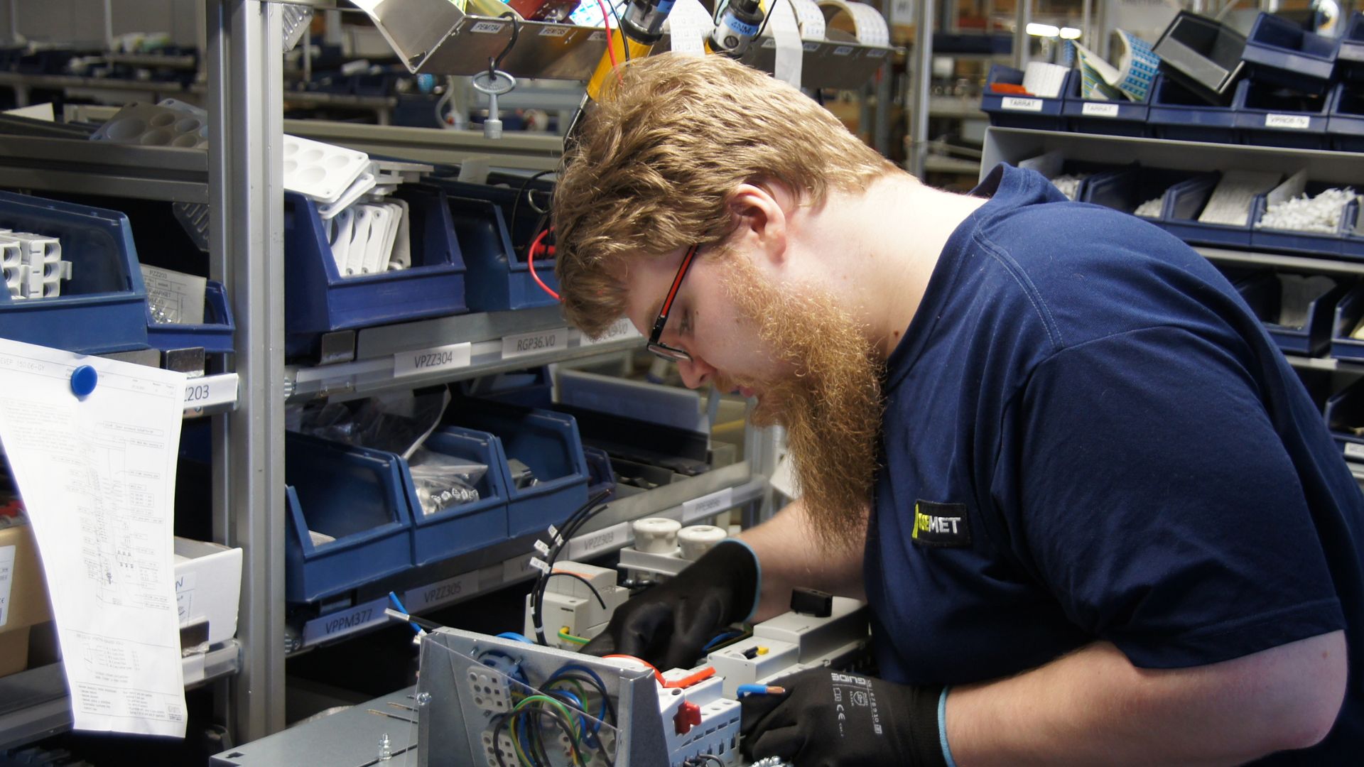 Jerry Halonen, student at RekryKoulutus, is wiring the electrical switchboard.